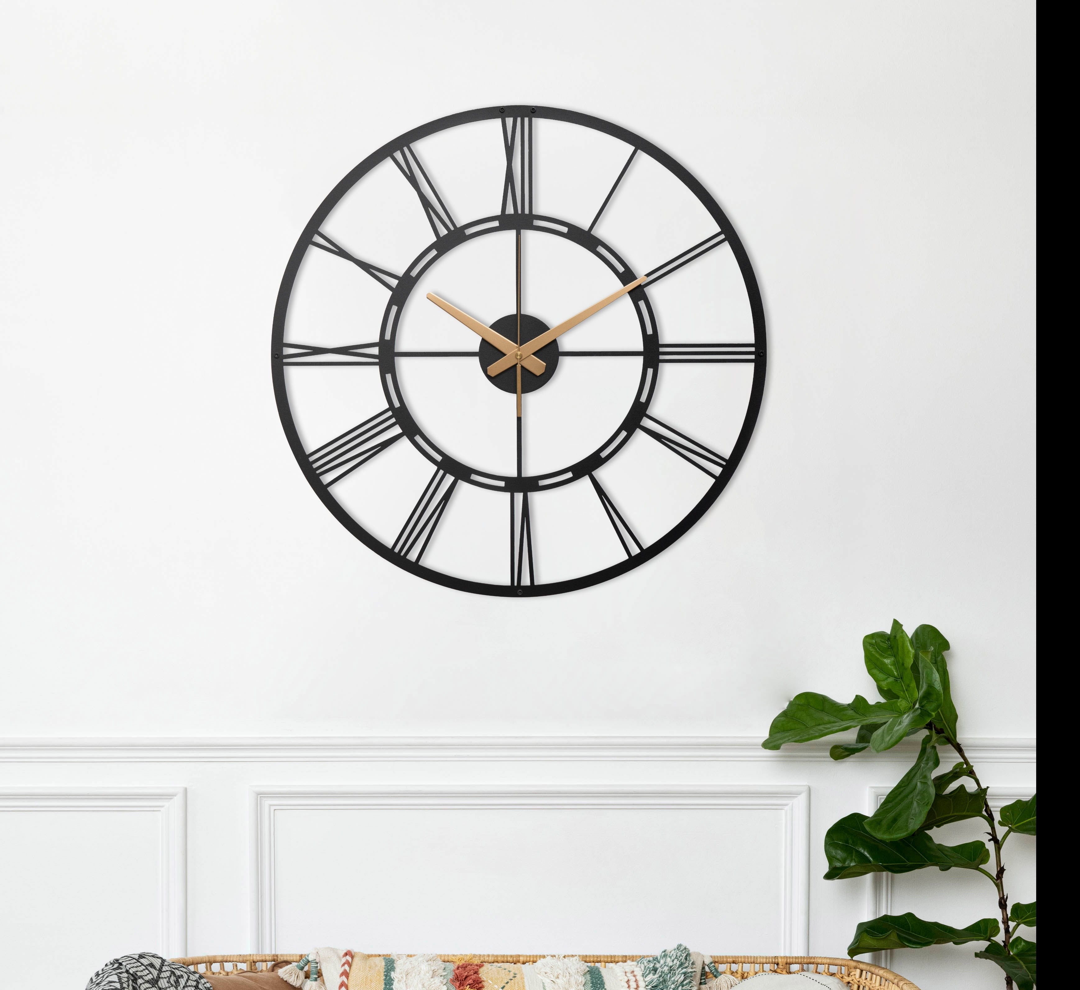 Unique Black Metal Wall Clock With White Roman Numbers
