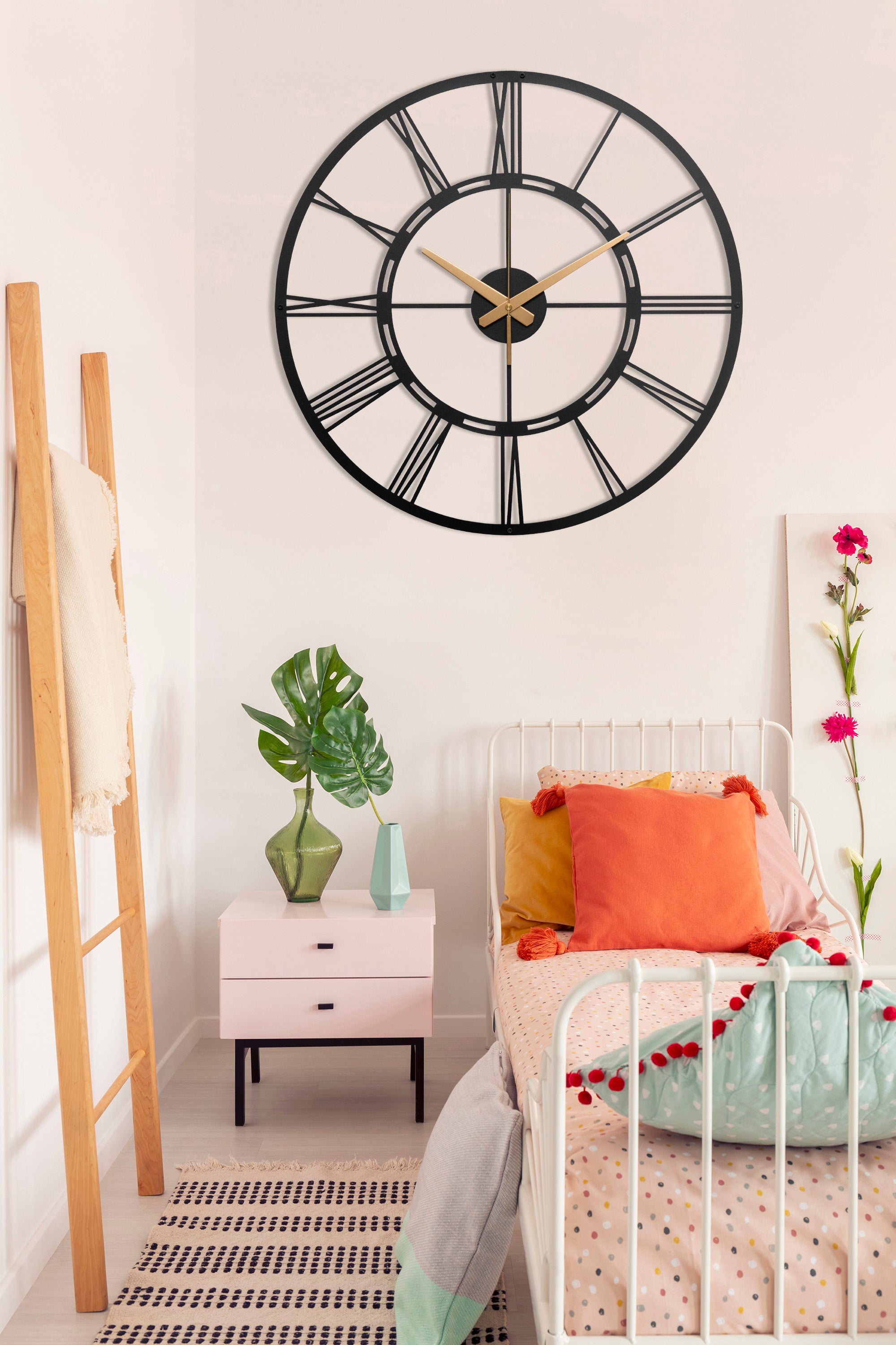 Unique Black Metal Wall Clock With White Roman Numbers